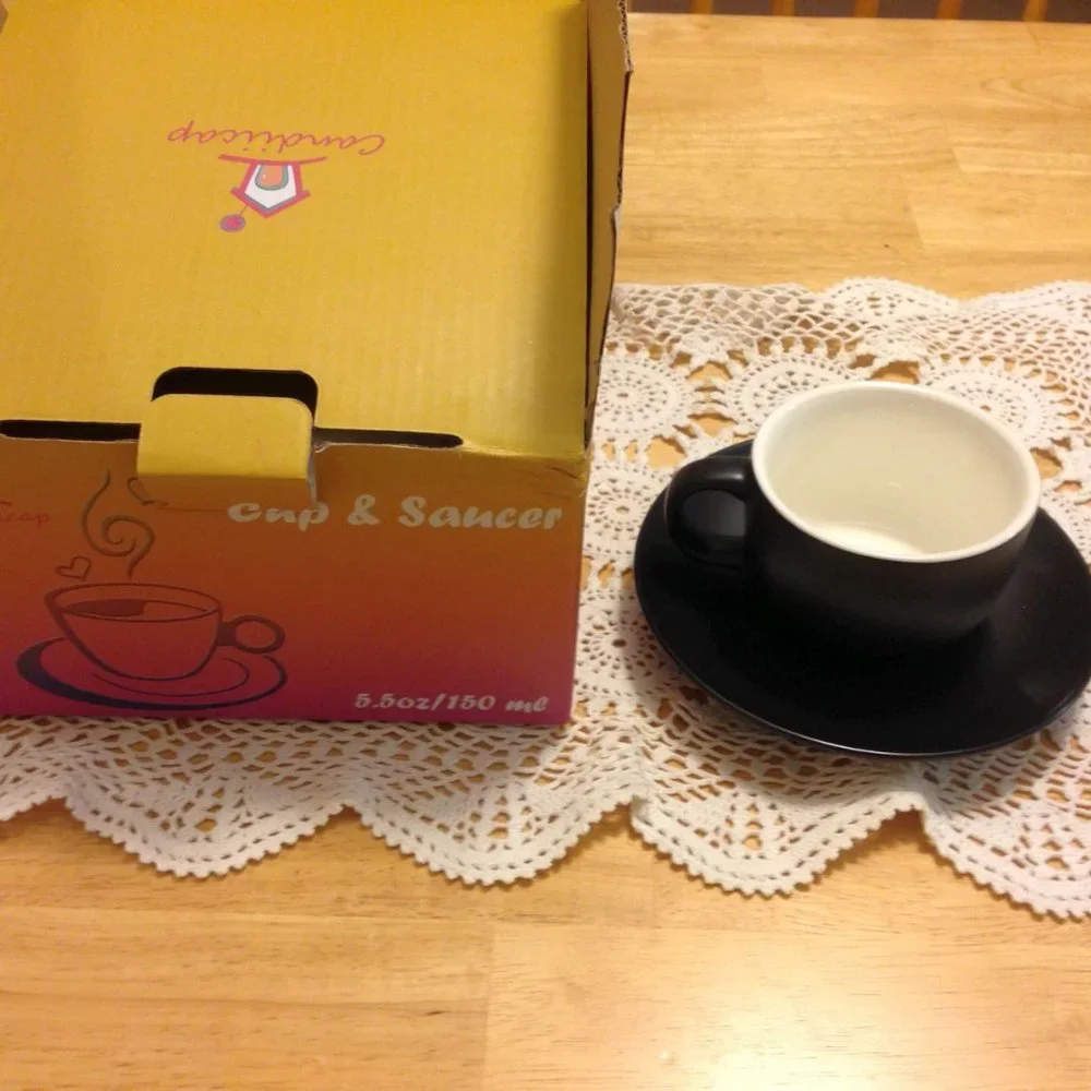 Pretty small coffee cup and saucer, new